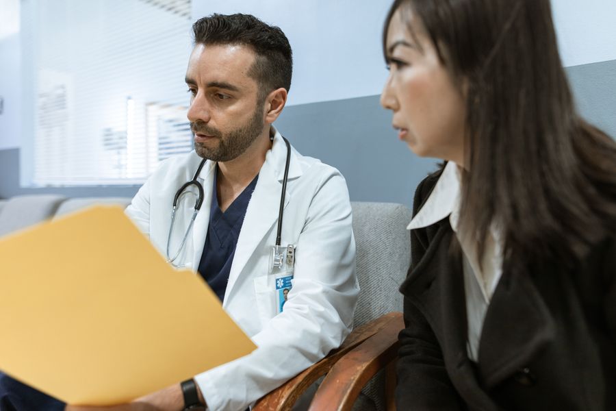 Two Alive MD clinicians reviewing a case together